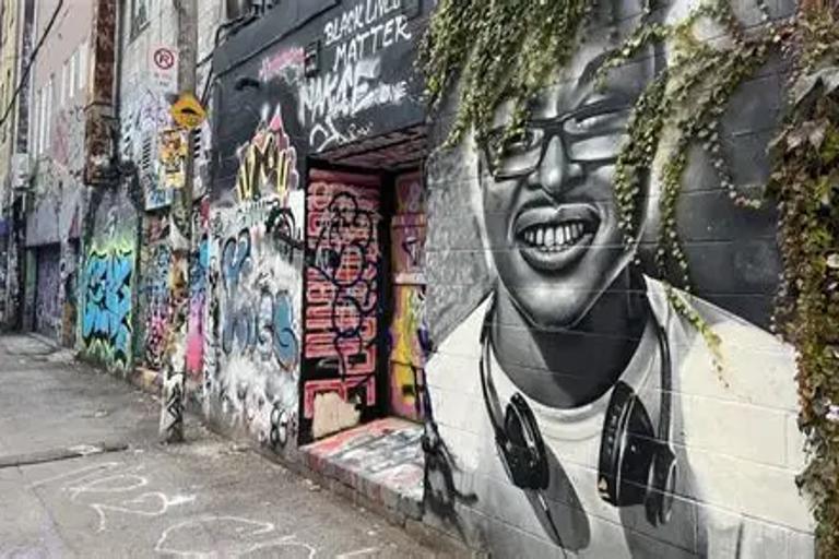 Local Artists Transform Alleyway into Vibrant Outdoor Gallery